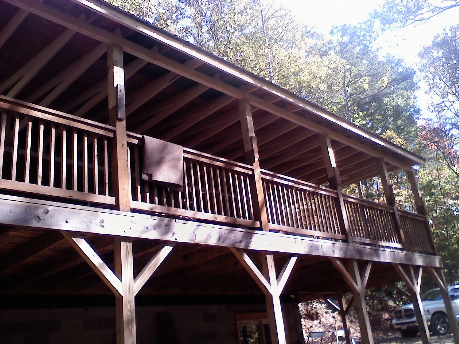 Timber framing under a new elevated porch and deck — Roof Leak Repair in Wesson by Roofing Brothers